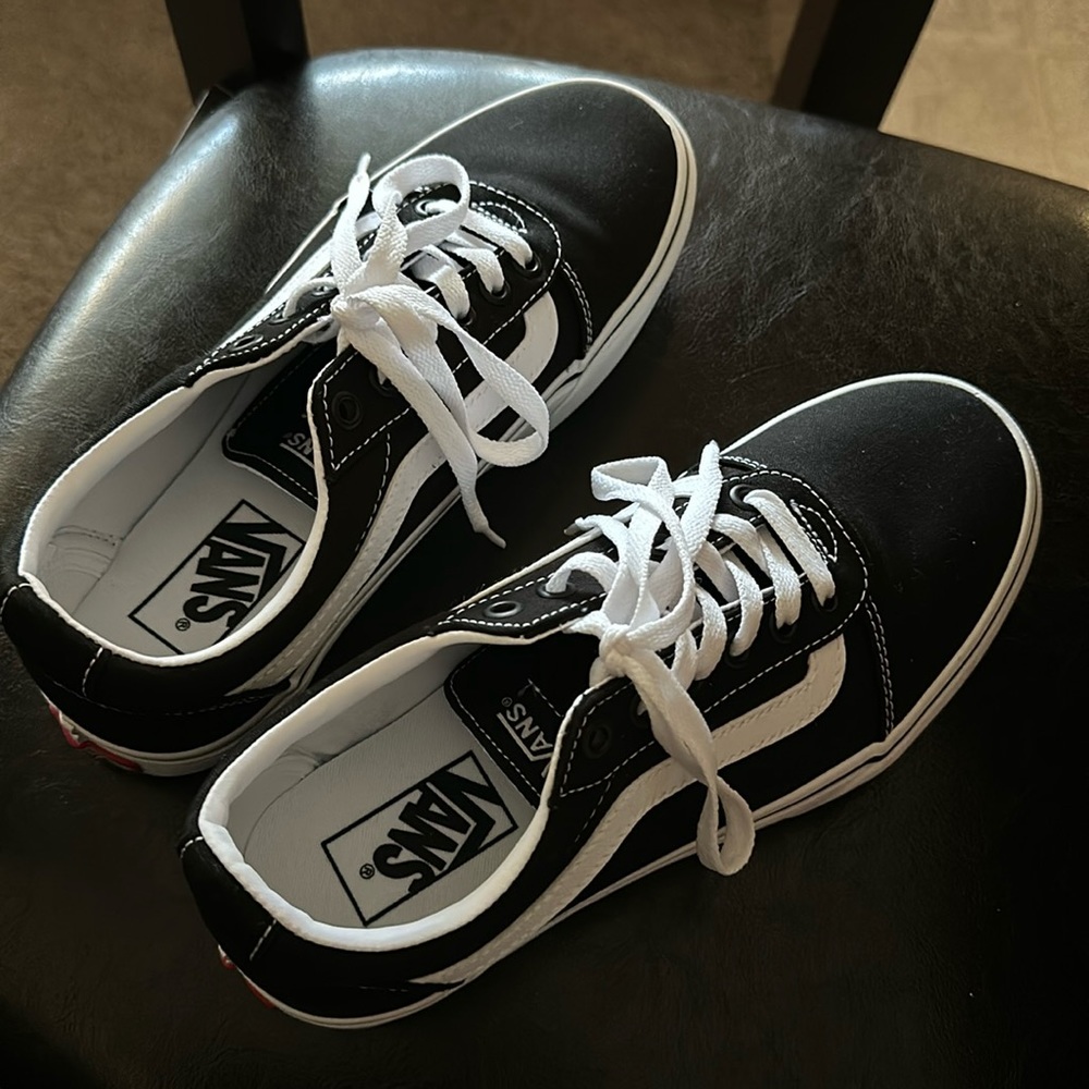 Black and white platform vans, old skool.